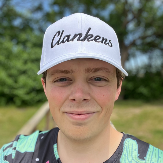 Clankers Disc Golf Hat — Adidas Performance, Moisture-Wicking & UPF 50+ (White | Black))
